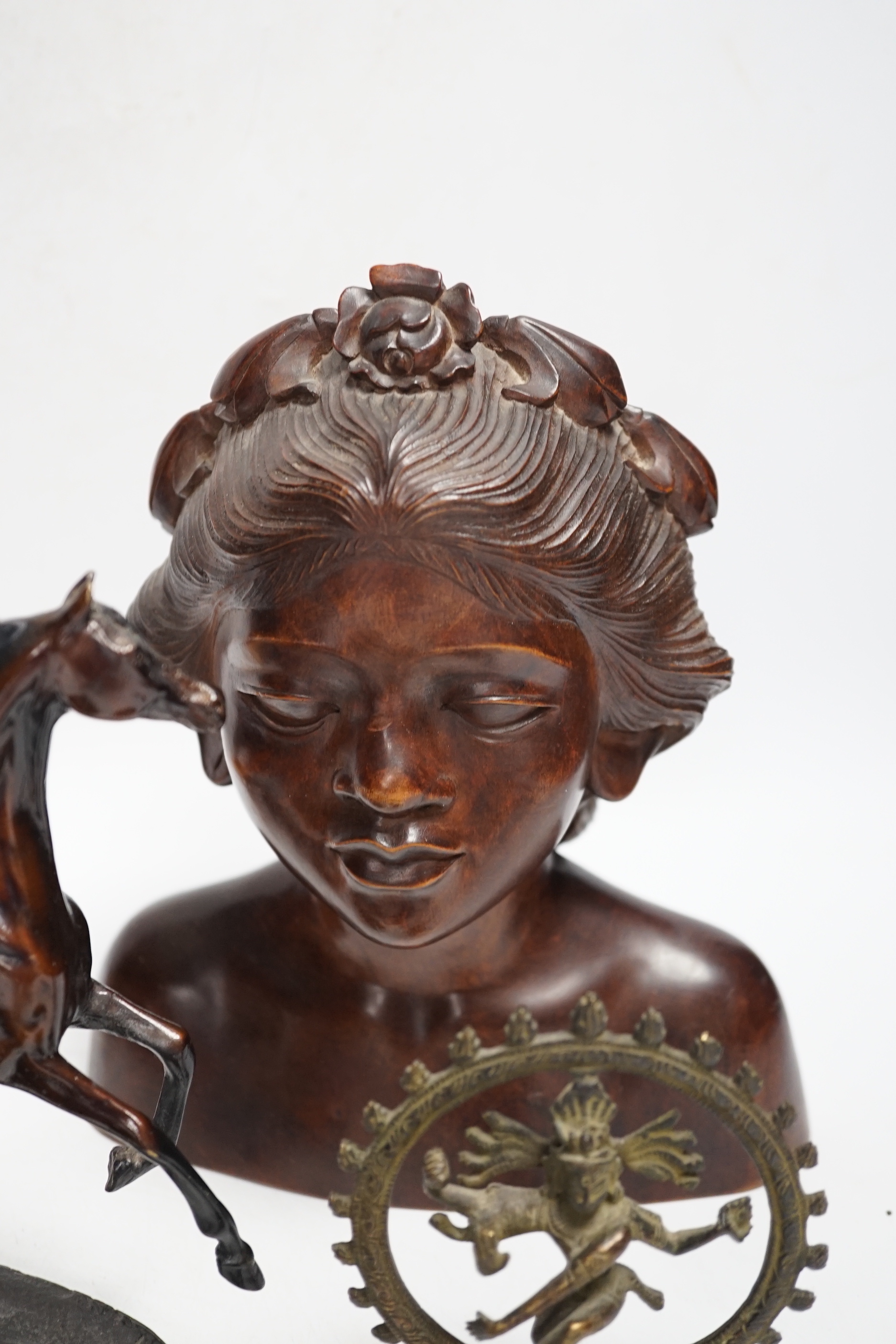 Mixed metal and carved ornaments, including a tortoise table bell, a statue of two dancers and a Balanese head, etc, 22cm